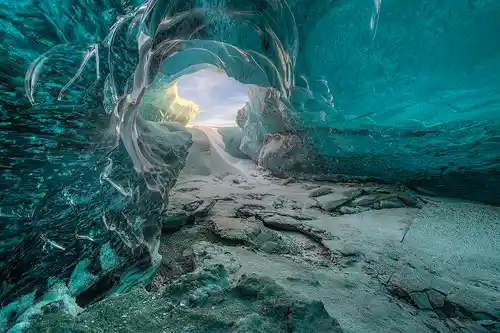 This stream carved ice cave image is a link to a larger version.
