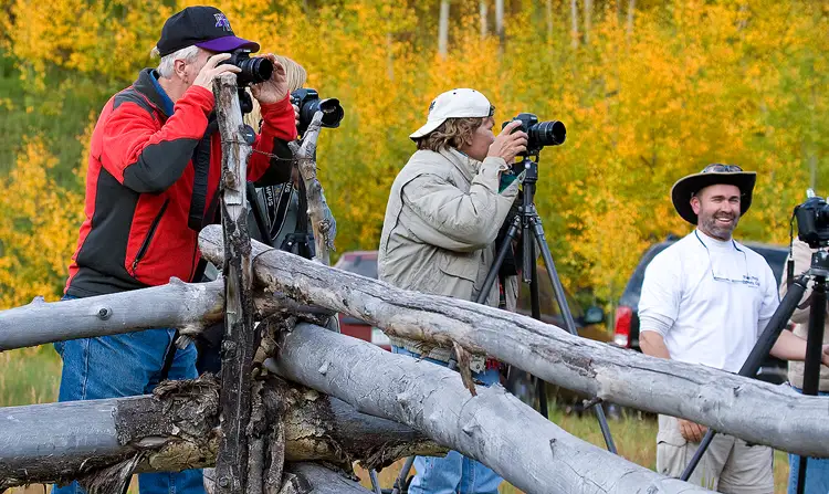 Photographers photographing autumn colors.