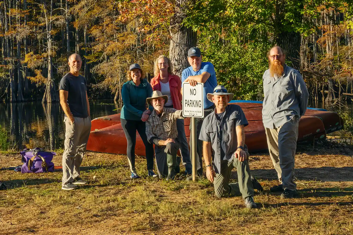 Group photo of photography workshop participants along the Big Cypress Bayou.