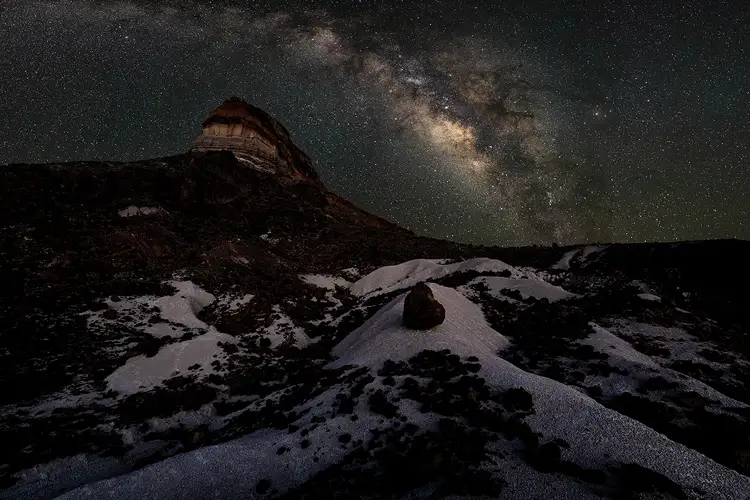 Milky Way above Cerro Castellan and white gypsum hills in Big Bend National Park.