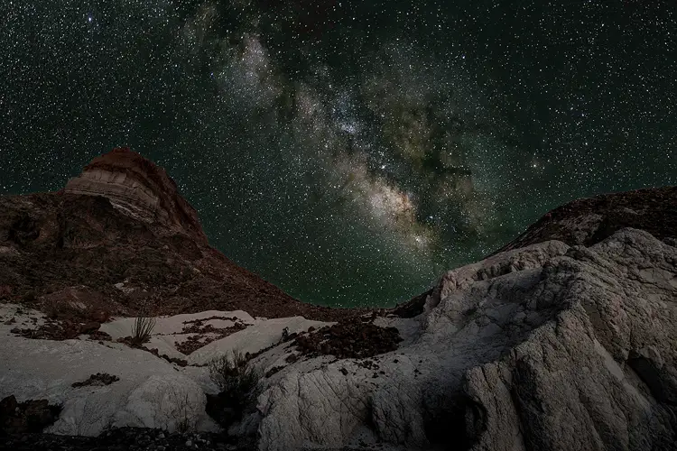 Milky Way above Cerro Castellan and desert badlands in Big Bend National Park.