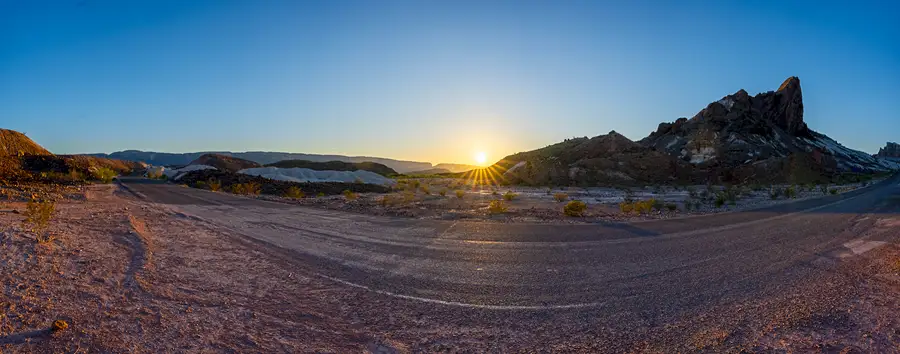 Sunset over volcanic desert formations in Big Bend National Park.