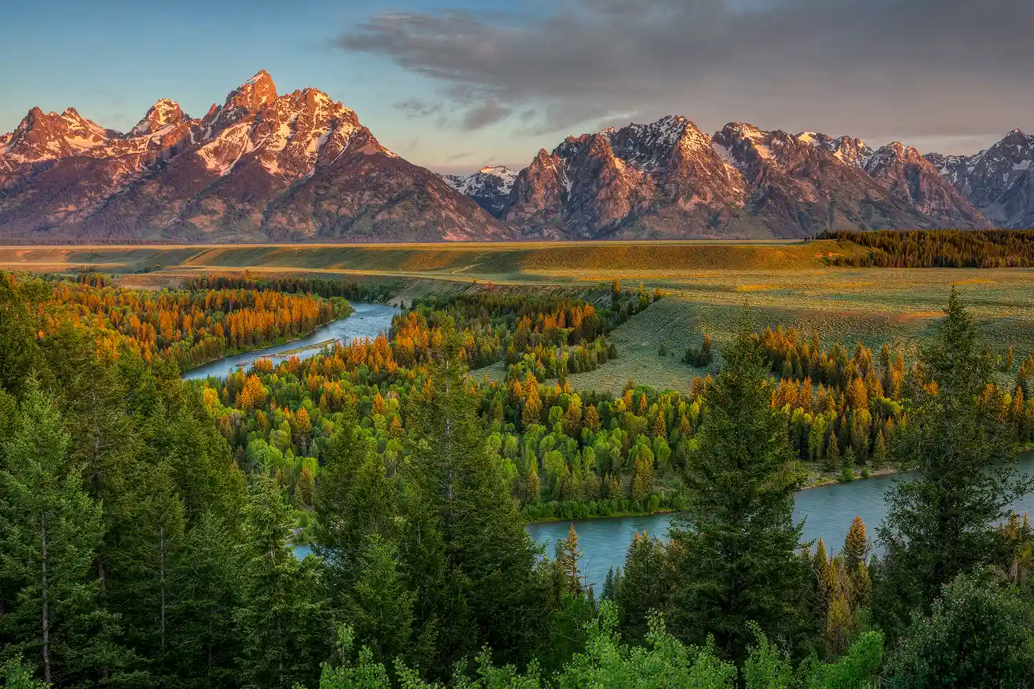 Sunrise light on the Teton Range from Snake River Overlook.